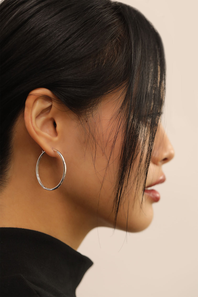 What do you think about women that wear hoop earrings? - Quora