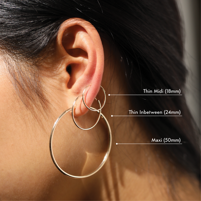 Sleek Gold Hoop Earrings Jewellery India Online - CaratLane.com